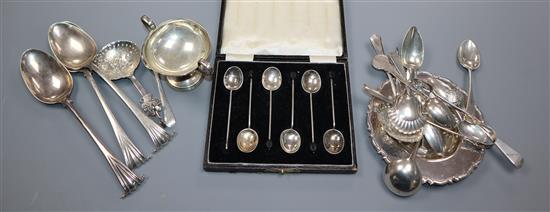 A set of four modern silver dishes, a small group of assorted silver flatware including a caddy spoon and a plated small cup.